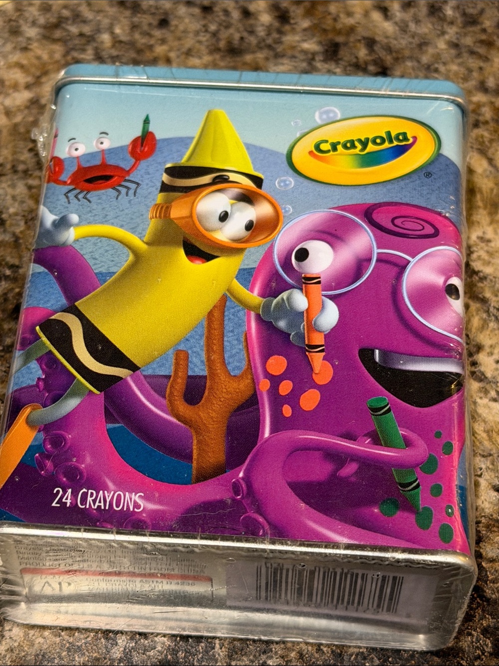 Crayola Tin with Yellow Crayon Character & Purple Octopus Artwork